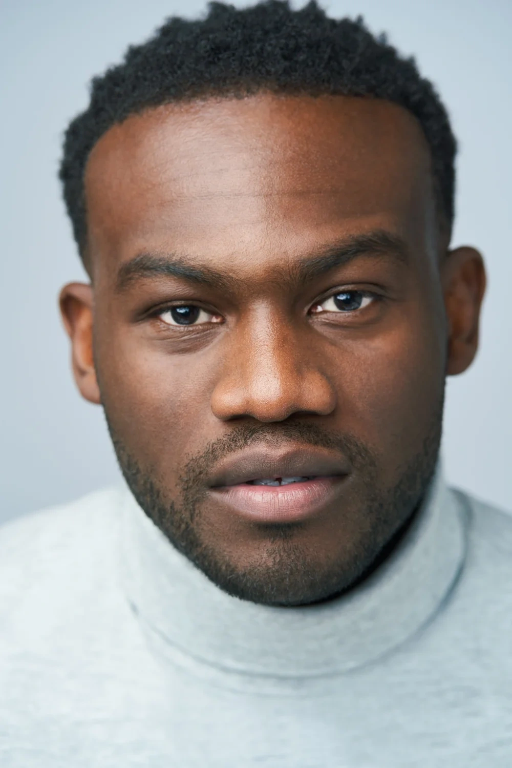 Commercial actor headshot with a warm smile