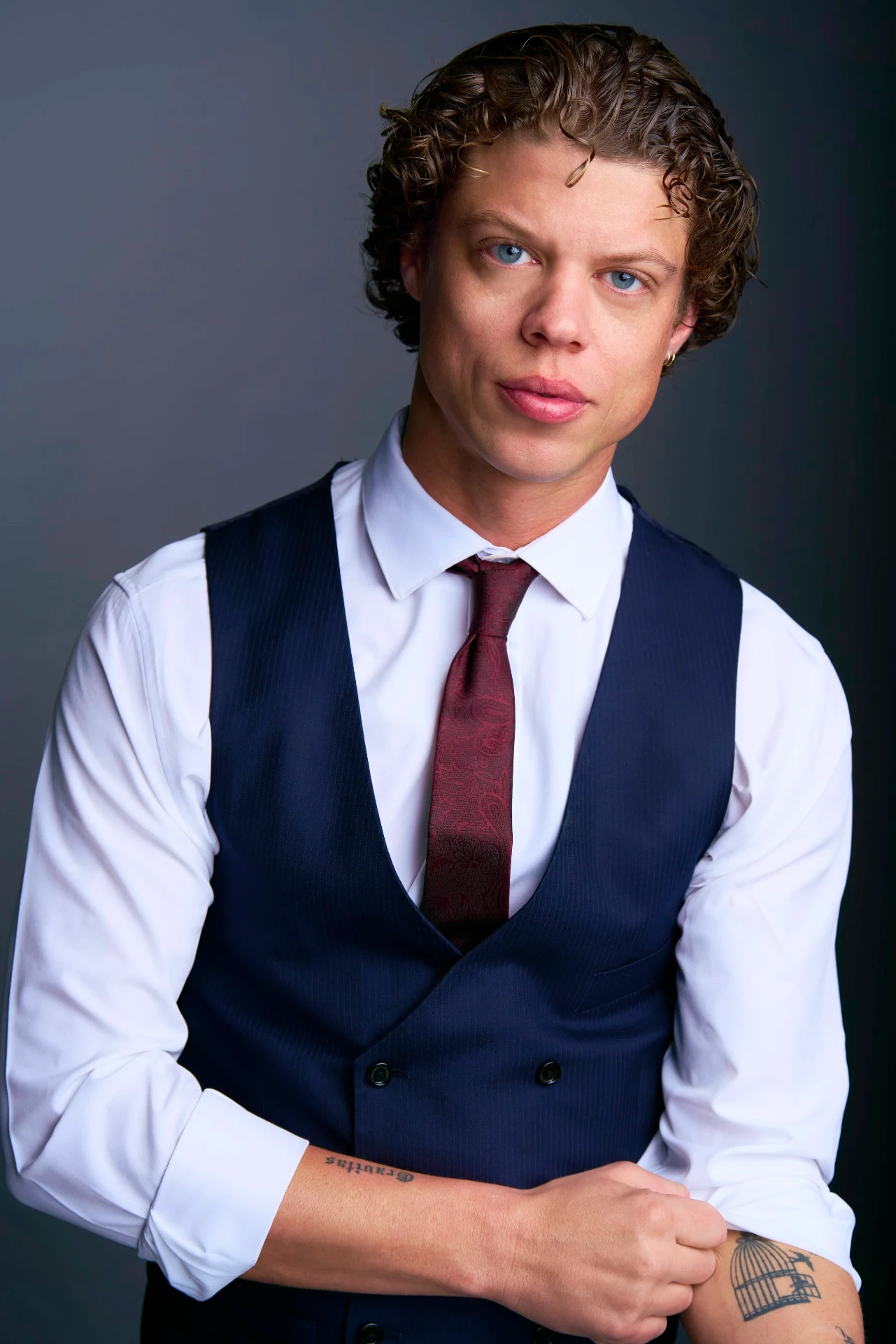 Editorial actor headshot of actor in a navy vest and tie, photographed by an Atlanta actor headshot photographer