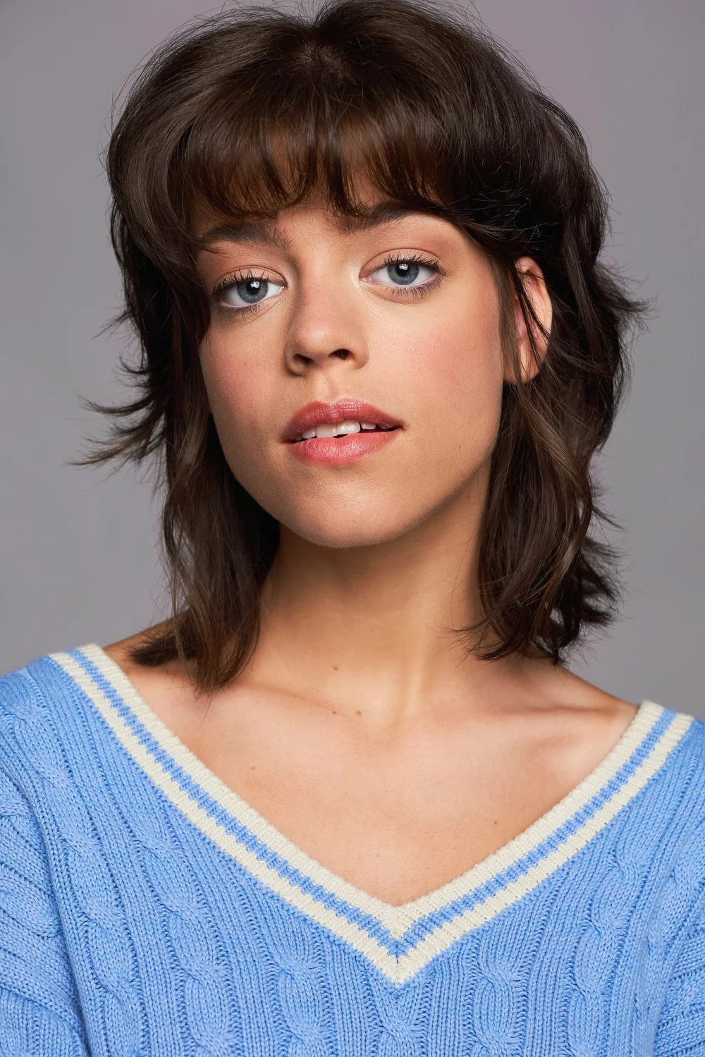 Atlanta actor headshot of a woman in a blue sweater by Chase Anderson Photo