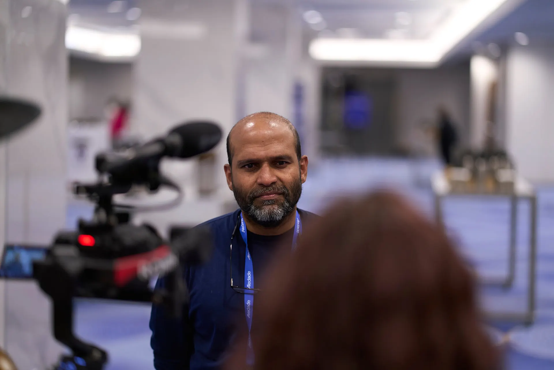 Attendee between sessions at Google's AI Academy in Atlanta