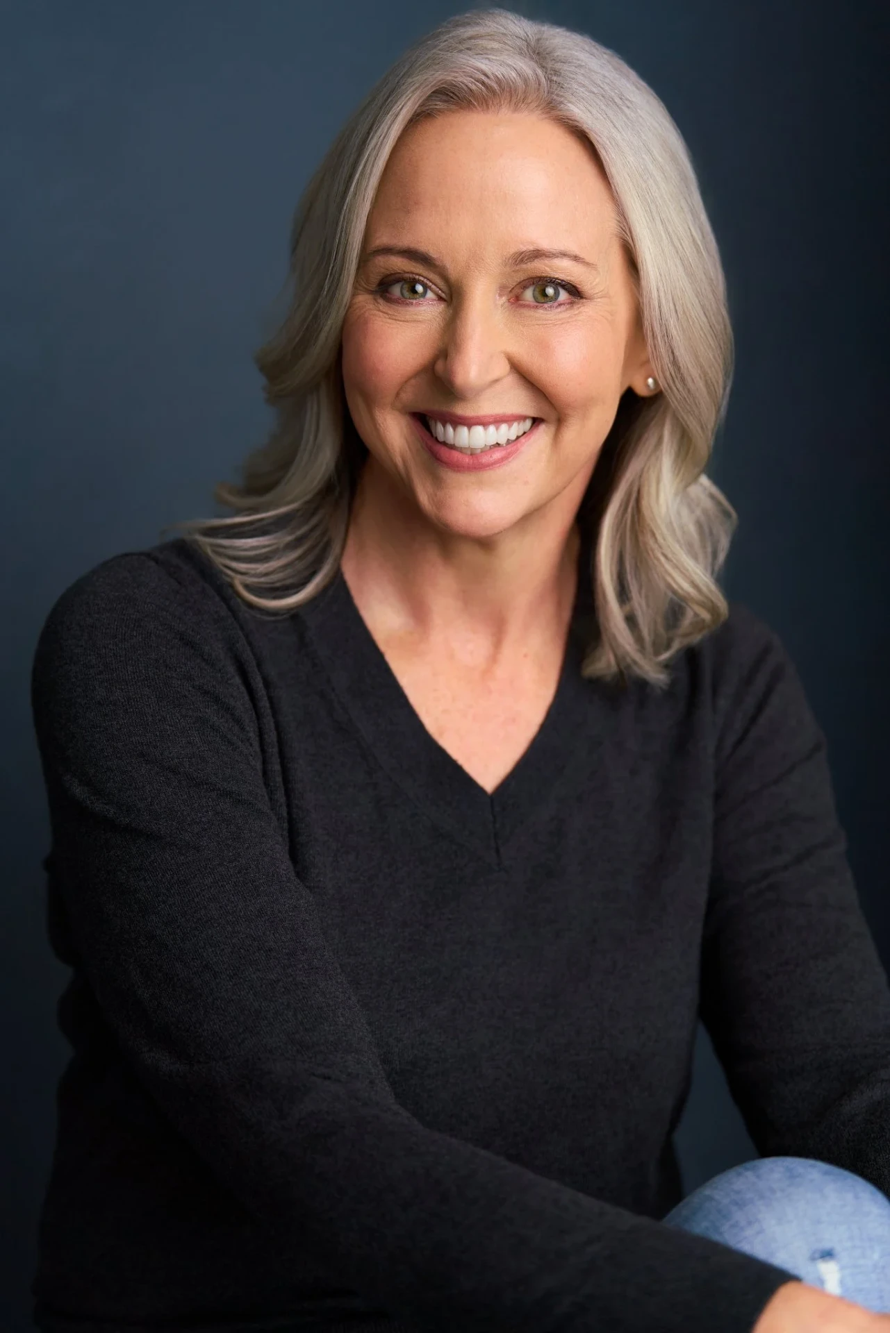 Editorial actor headshot of silver-haired actress in a black sweater, photographed by an Atlanta actor headshot photographer