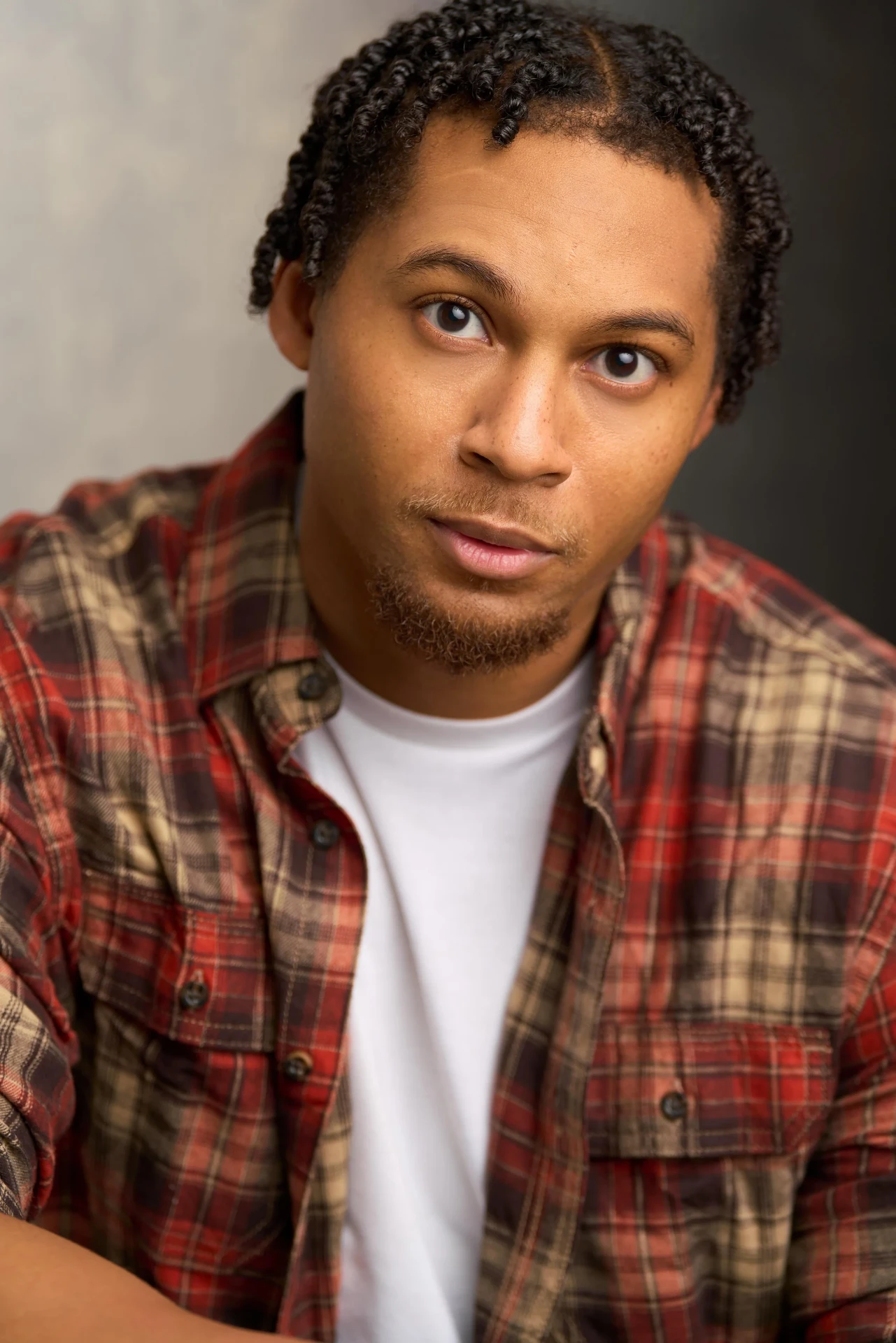 Editorial actor headshot of actor in a plaid flannel shirt, photographed by an Atlanta actor headshot photographer