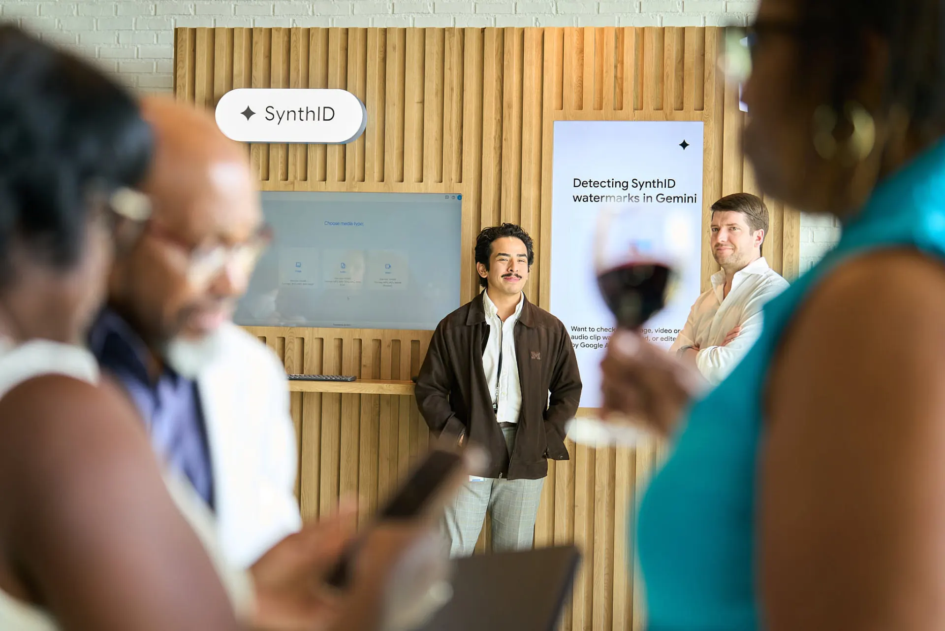 Attendees exploring a Gemini demo station at Google's AI Academy