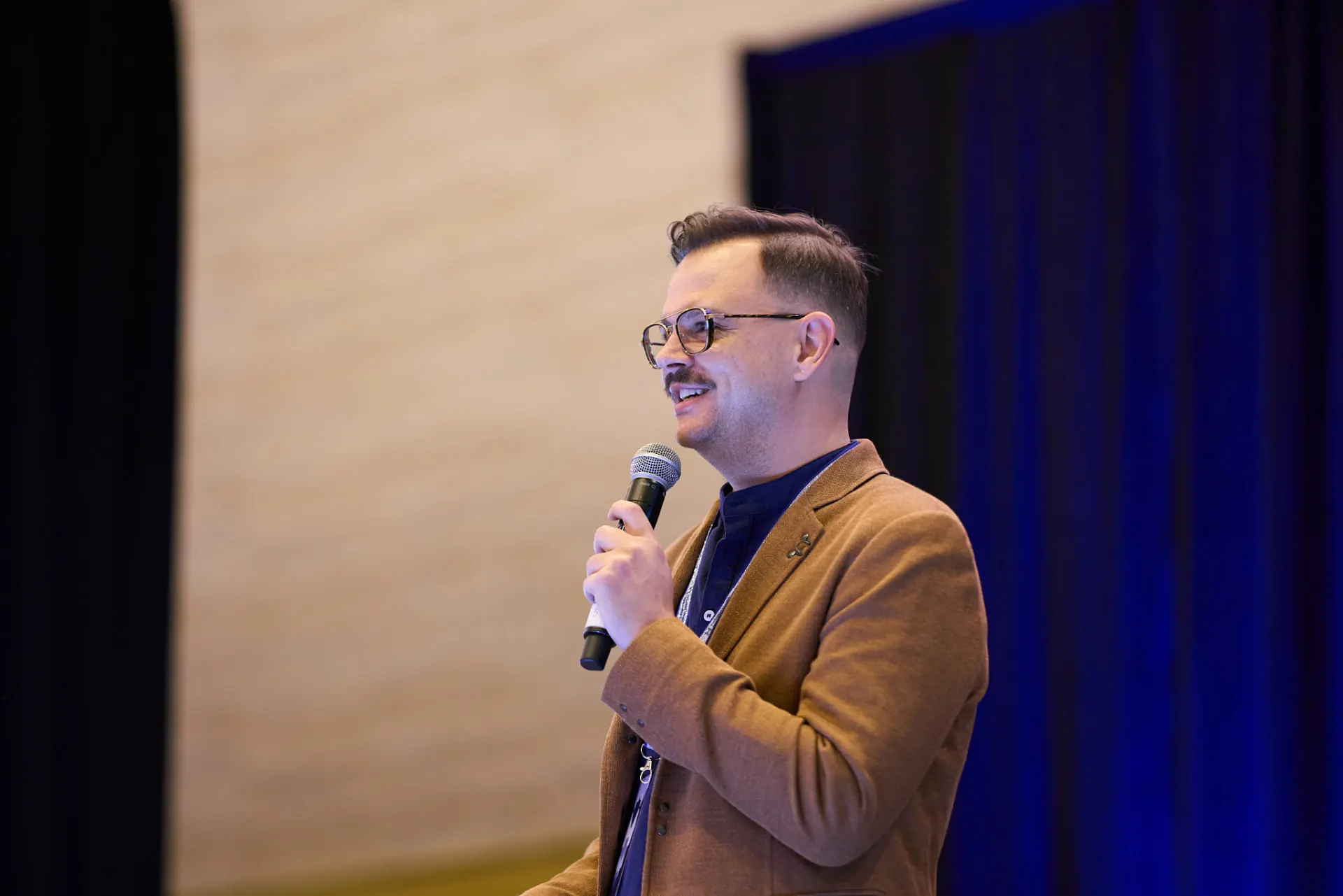 Speaker addressing a conference audience