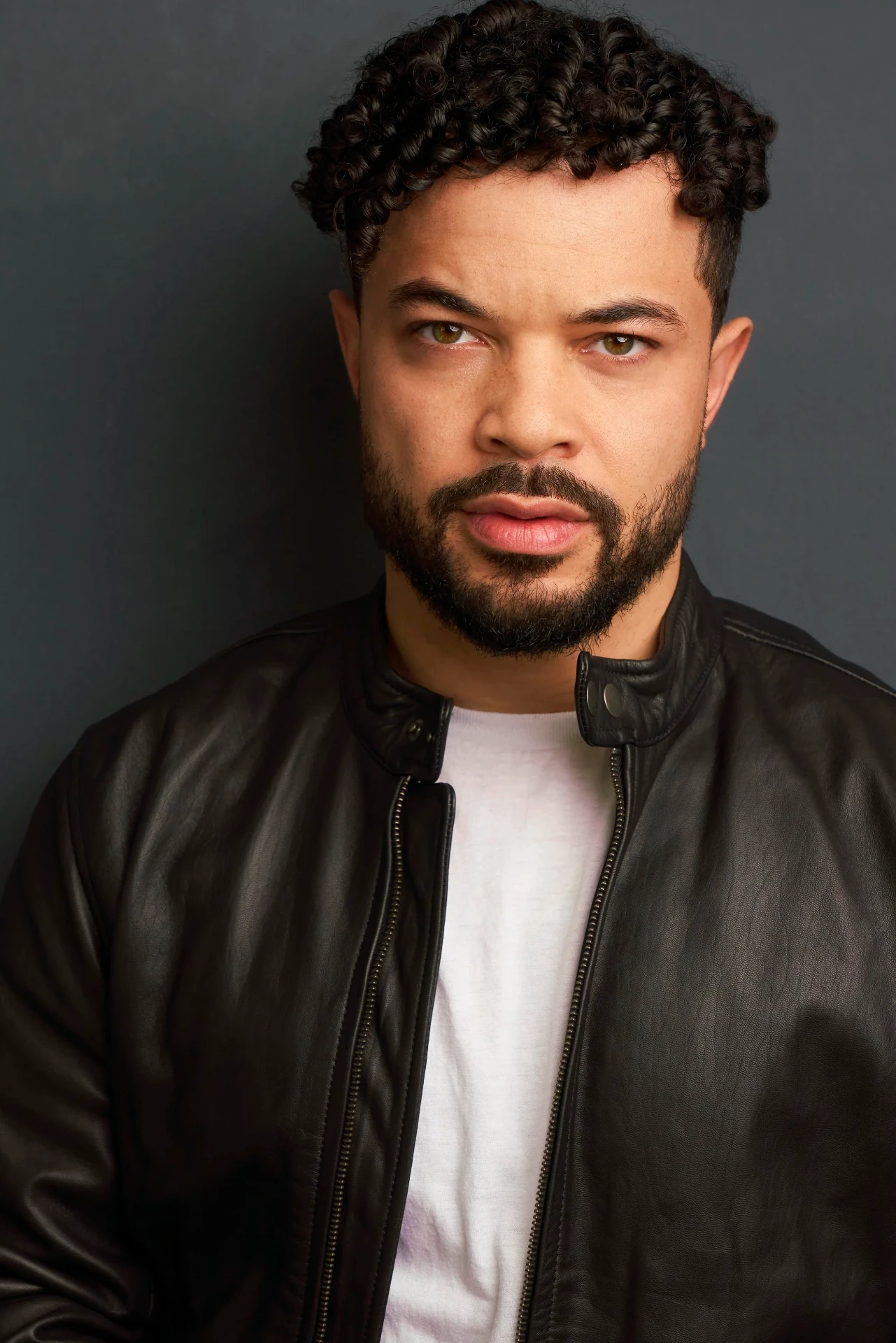 Editorial actor headshot of bearded actor in a black leather jacket, photographed by an Atlanta actor headshot photographer
