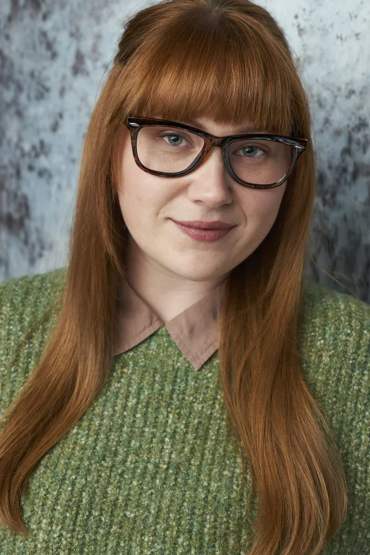 Jessica Pickard actor headshot with red hair and glasses photographed in Atlanta