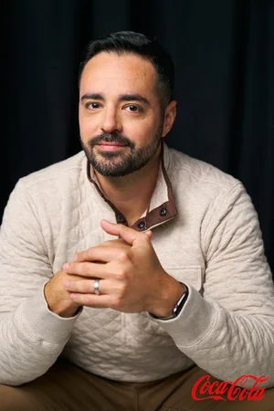 Close-up professional headshot on a clean light background